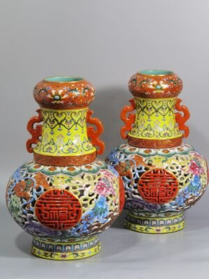 Qing Dynasty Qianlong enamel color hollowed double ear revolving heart set bottle