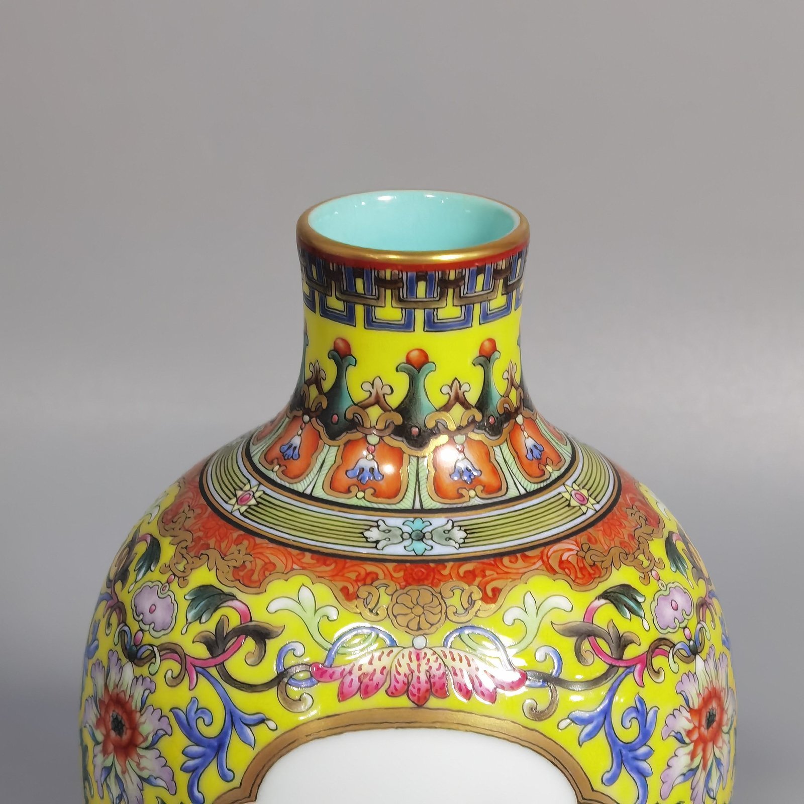 Qing Dynasty Qianlong enamel yellow ground consecrated baby play vase