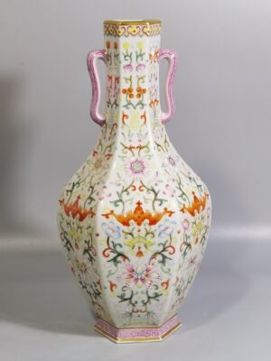 Qing Dynasty Qianlong pair of white-ground pastel-painted double-eared hexagonal vases