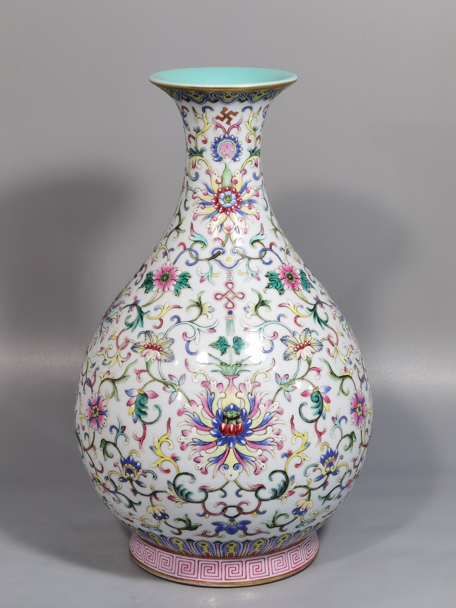 Qing Dynasty Qianlong white ground pastel color blessing and longevity lotus pattern jade pot