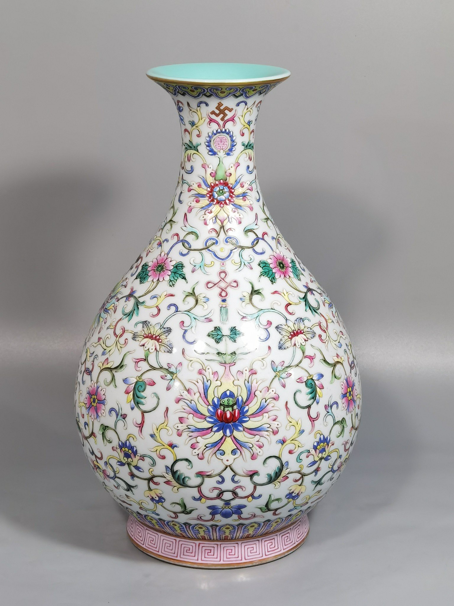 Qing Dynasty Qianlong white ground pastel color blessing and longevity lotus pattern jade pot