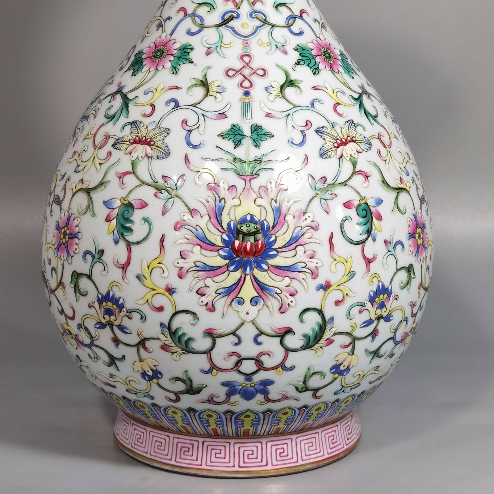 Qing Dynasty Qianlong white ground pastel color blessing and longevity lotus pattern jade pot