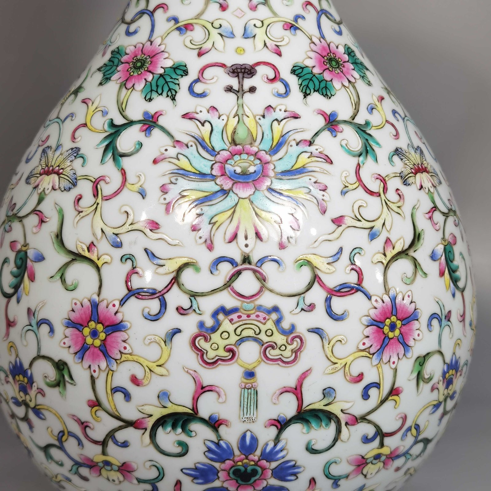 Qing Dynasty Qianlong white ground pastel color blessing and longevity lotus pattern jade pot