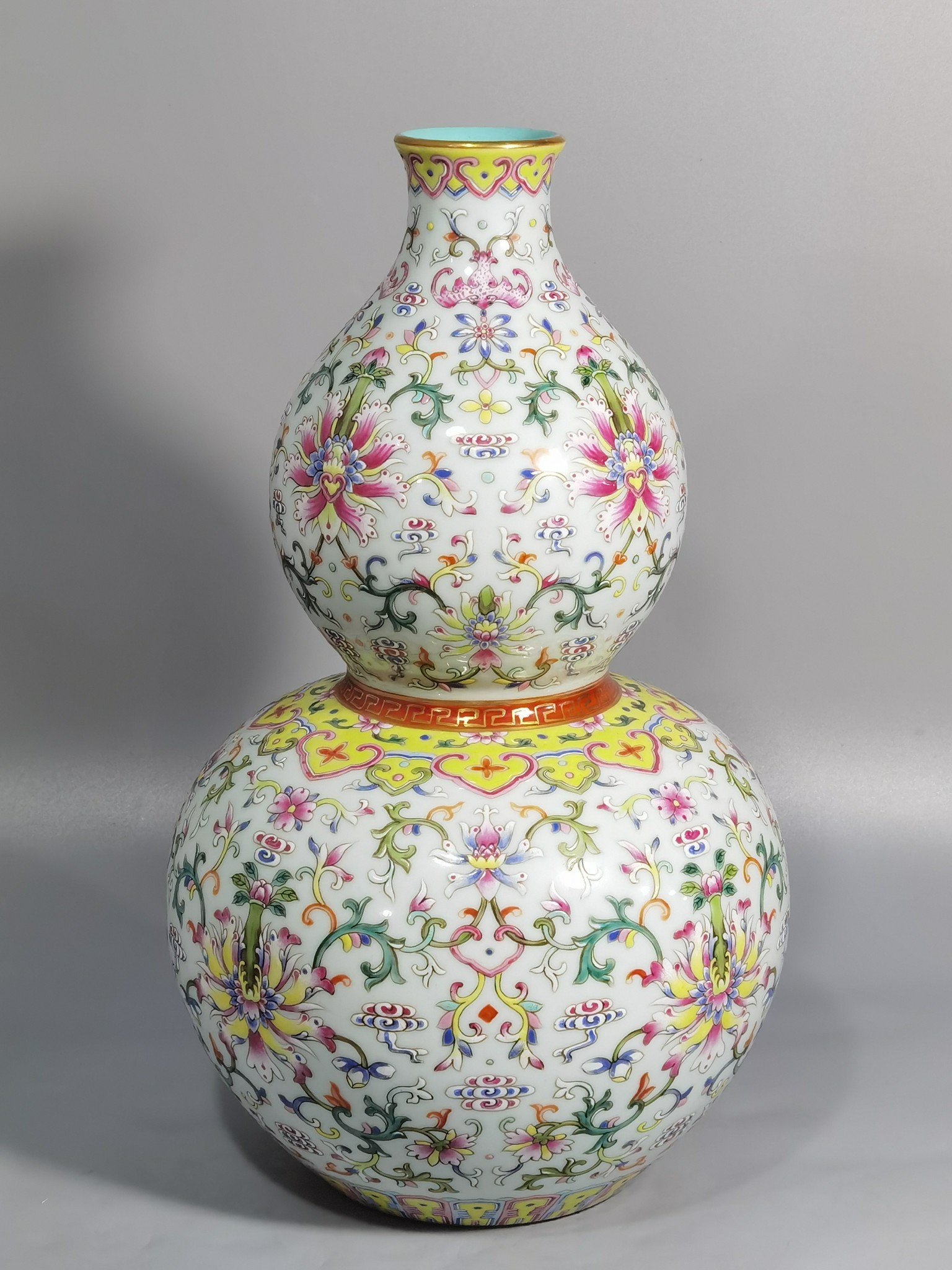 Qing Dynasty Qianlong white ground pastel-colored gourd vase