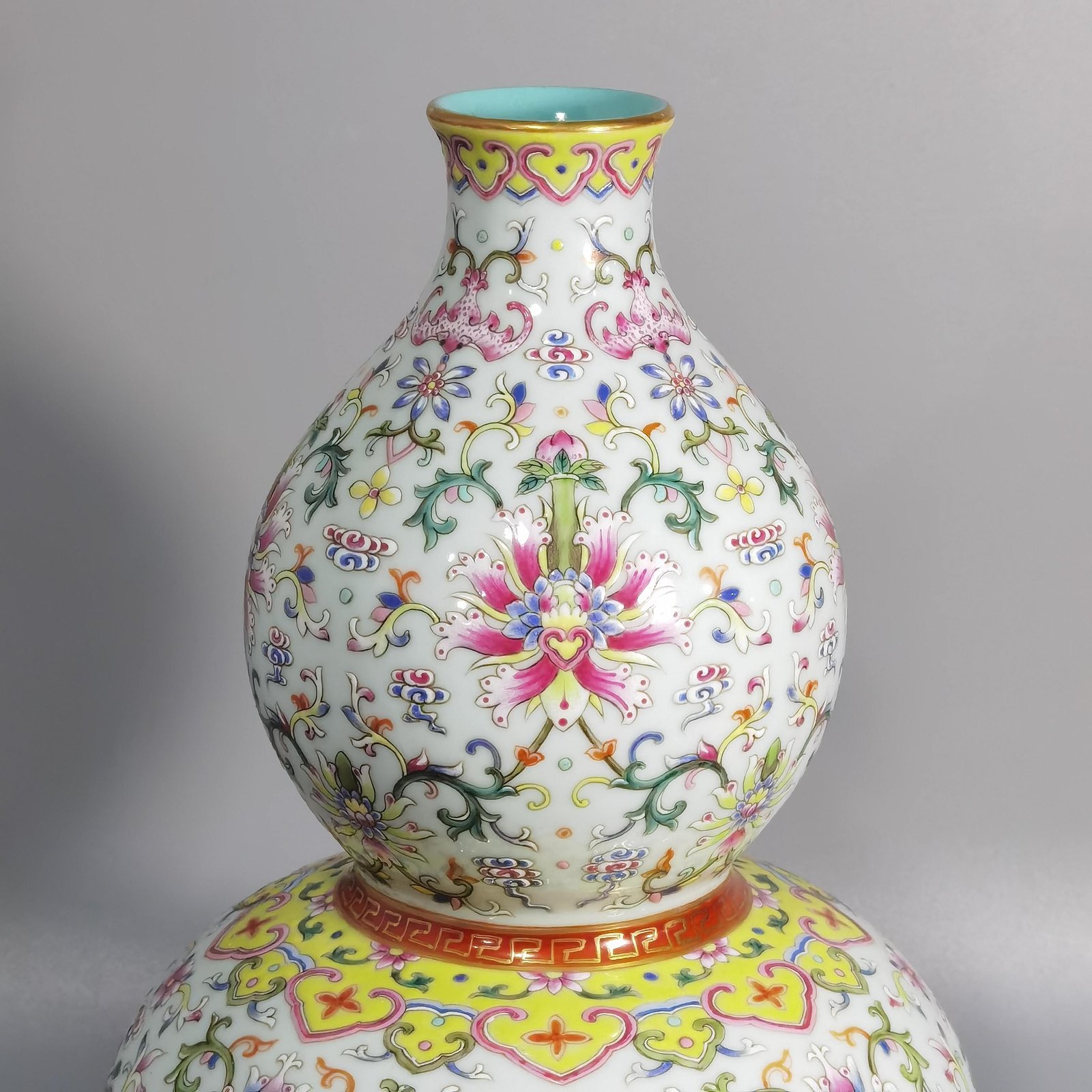Qing Dynasty Qianlong white ground pastel-colored gourd vase