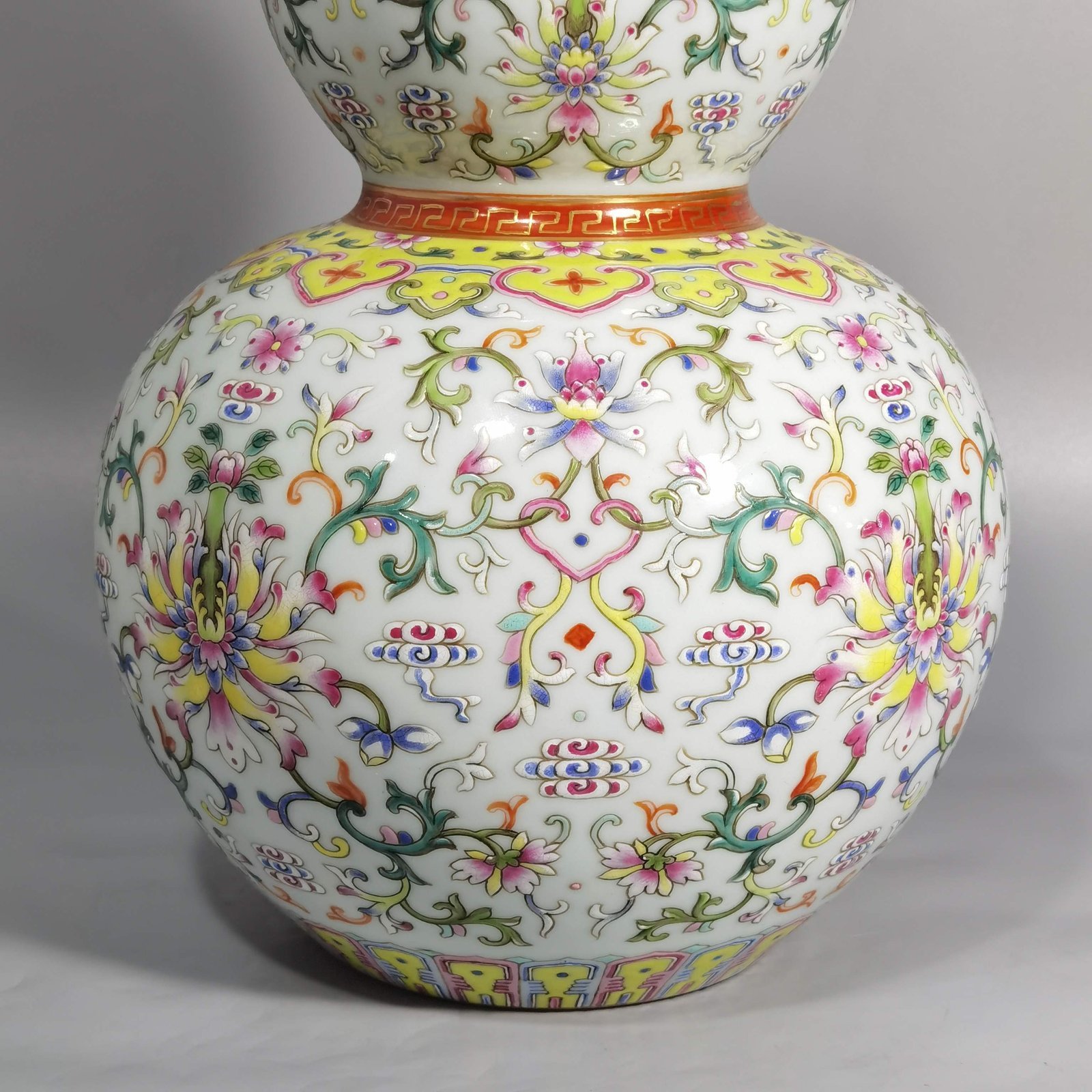 Qing Dynasty Qianlong white ground pastel-colored gourd vase