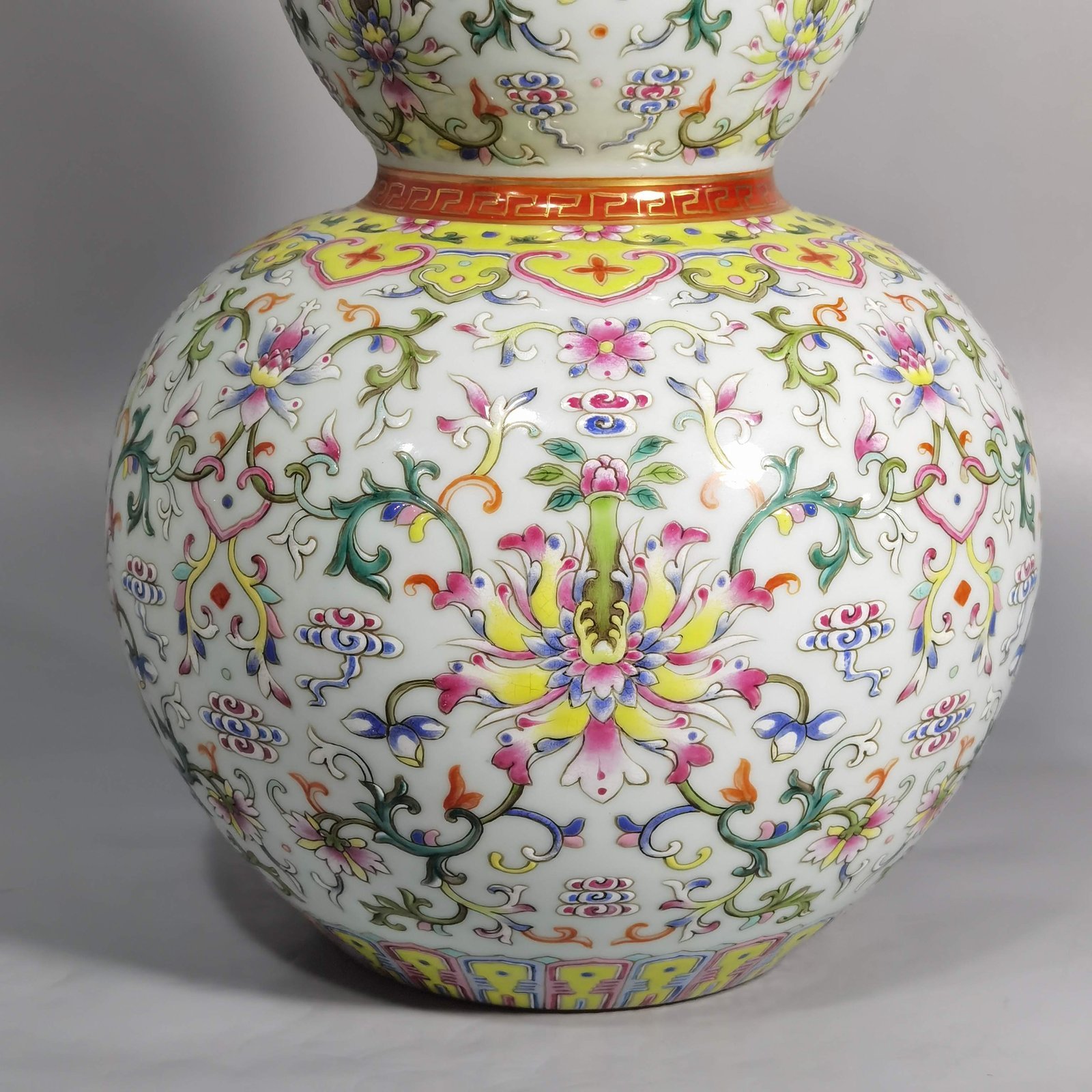 Qing Dynasty Qianlong white ground pastel-colored gourd vase