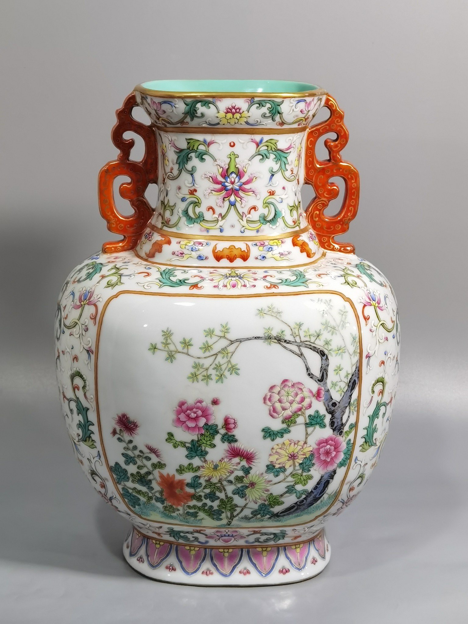 Qing Dynasty Qianlong white ground pastel lotus window flower double-eared flat vase