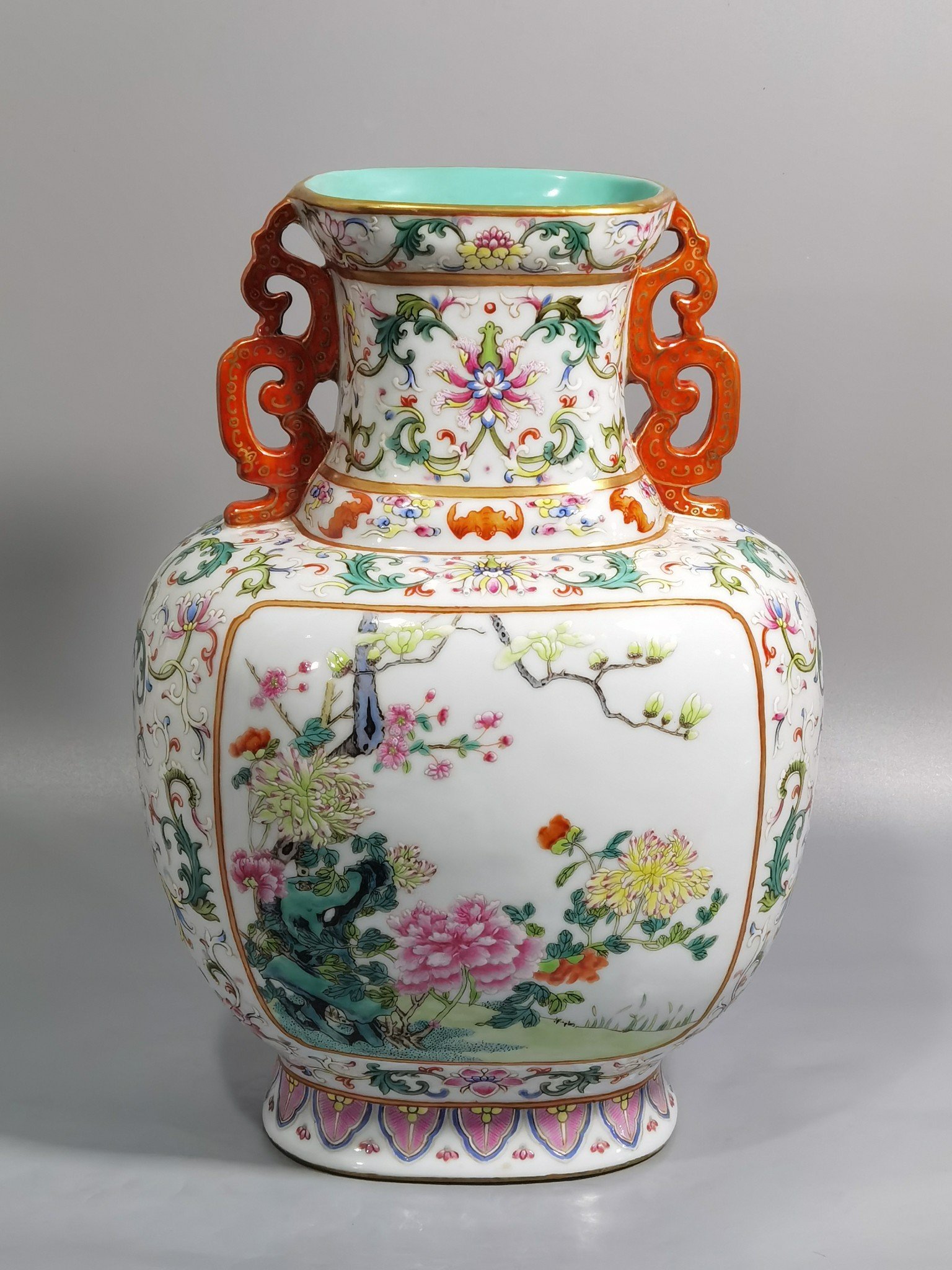 Qing Dynasty Qianlong white ground pastel lotus window flower double-eared flat vase