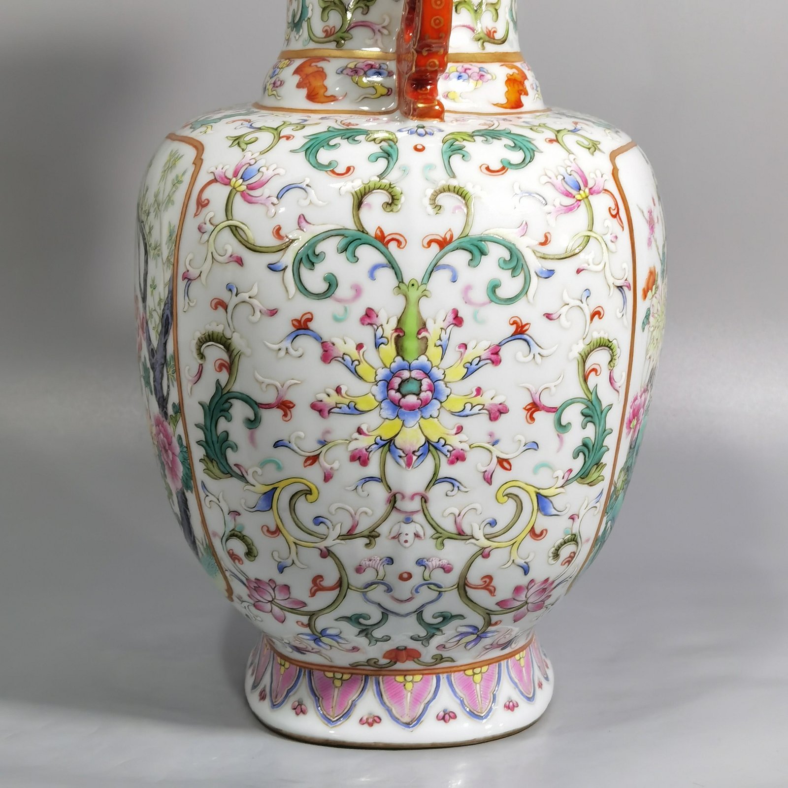 Qing Dynasty Qianlong white ground pastel lotus window flower double-eared flat vase