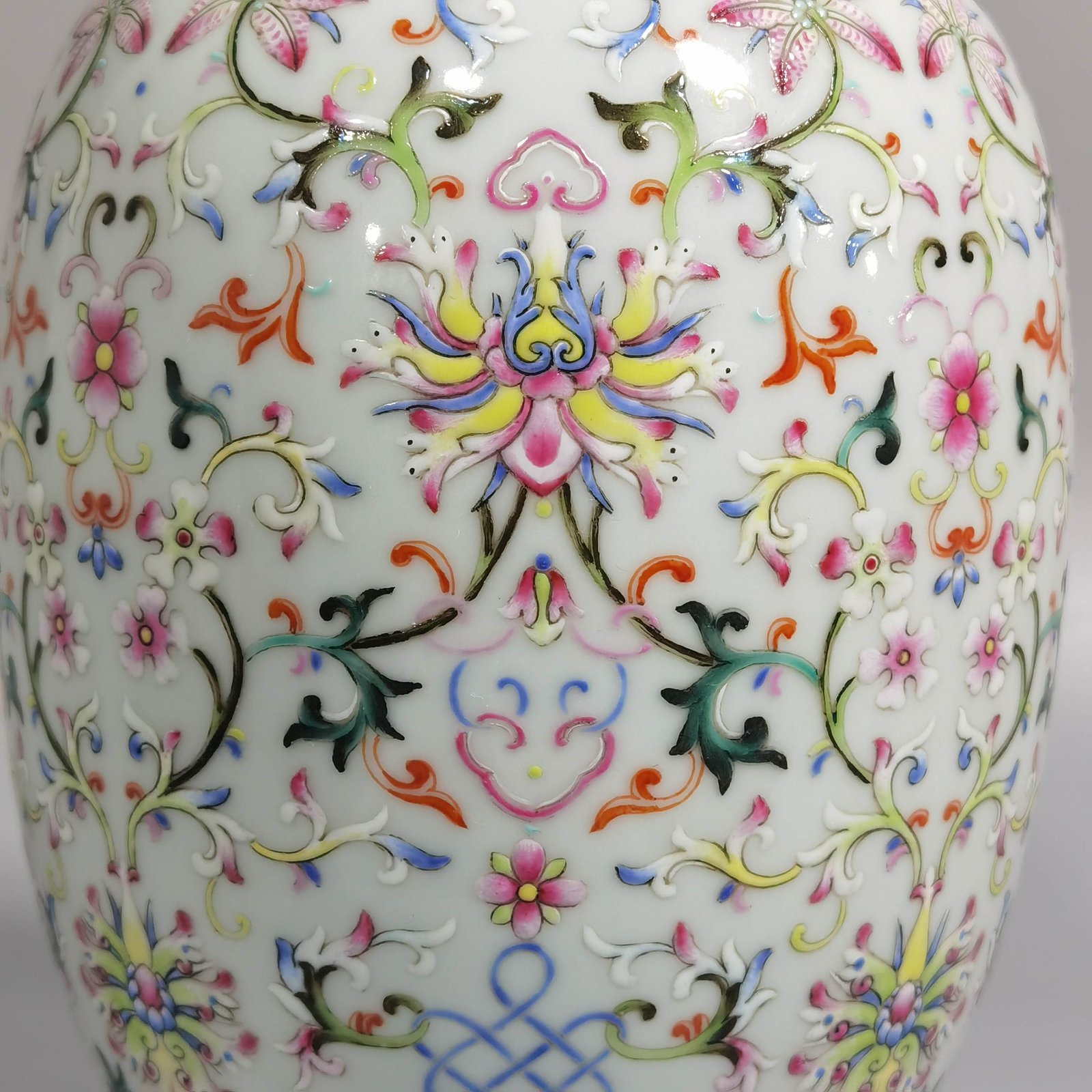 Qing Dynasty Qianlong white ground pastel colored lotus pattern covered jar