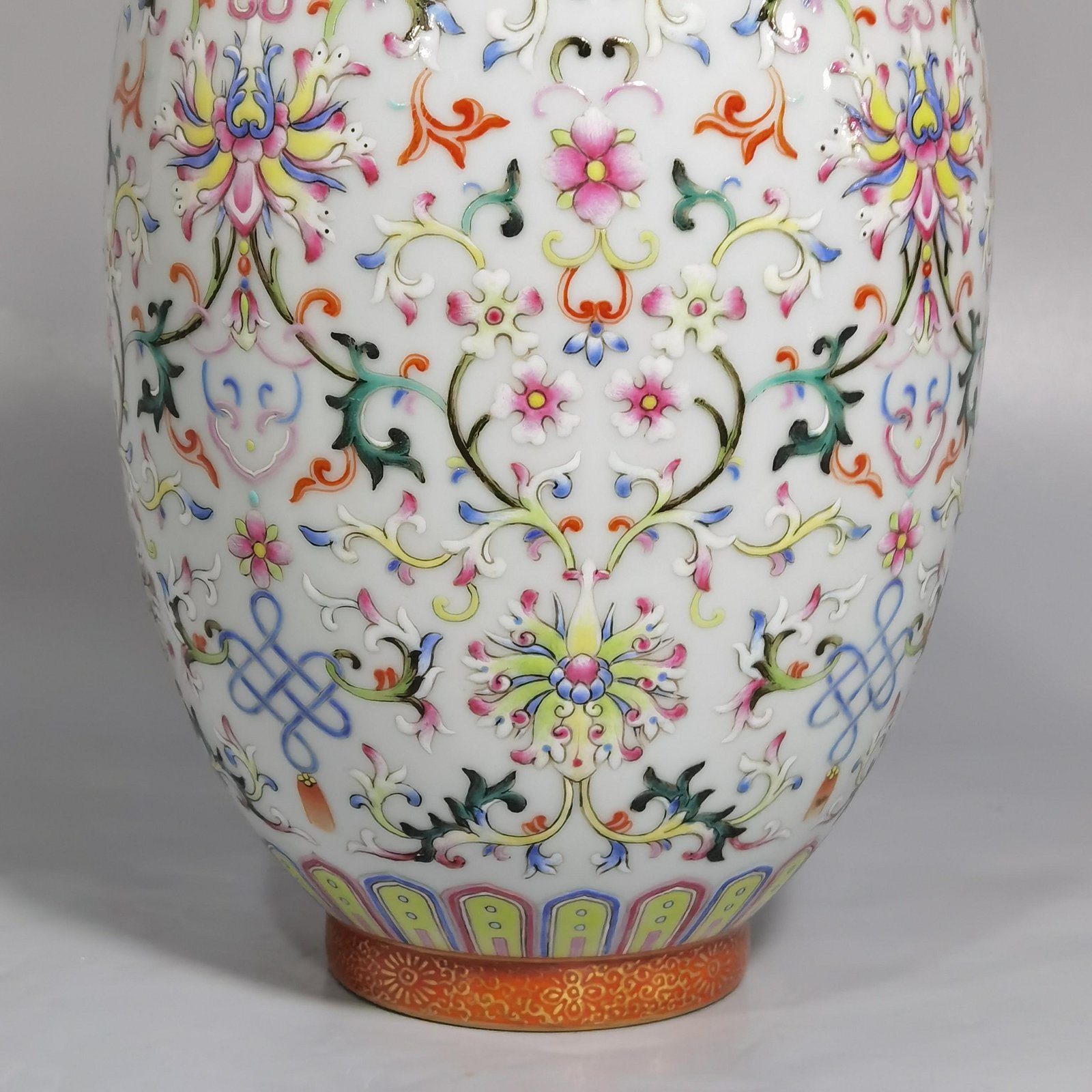 Qing Dynasty Qianlong white ground pastel colored lotus pattern covered jar