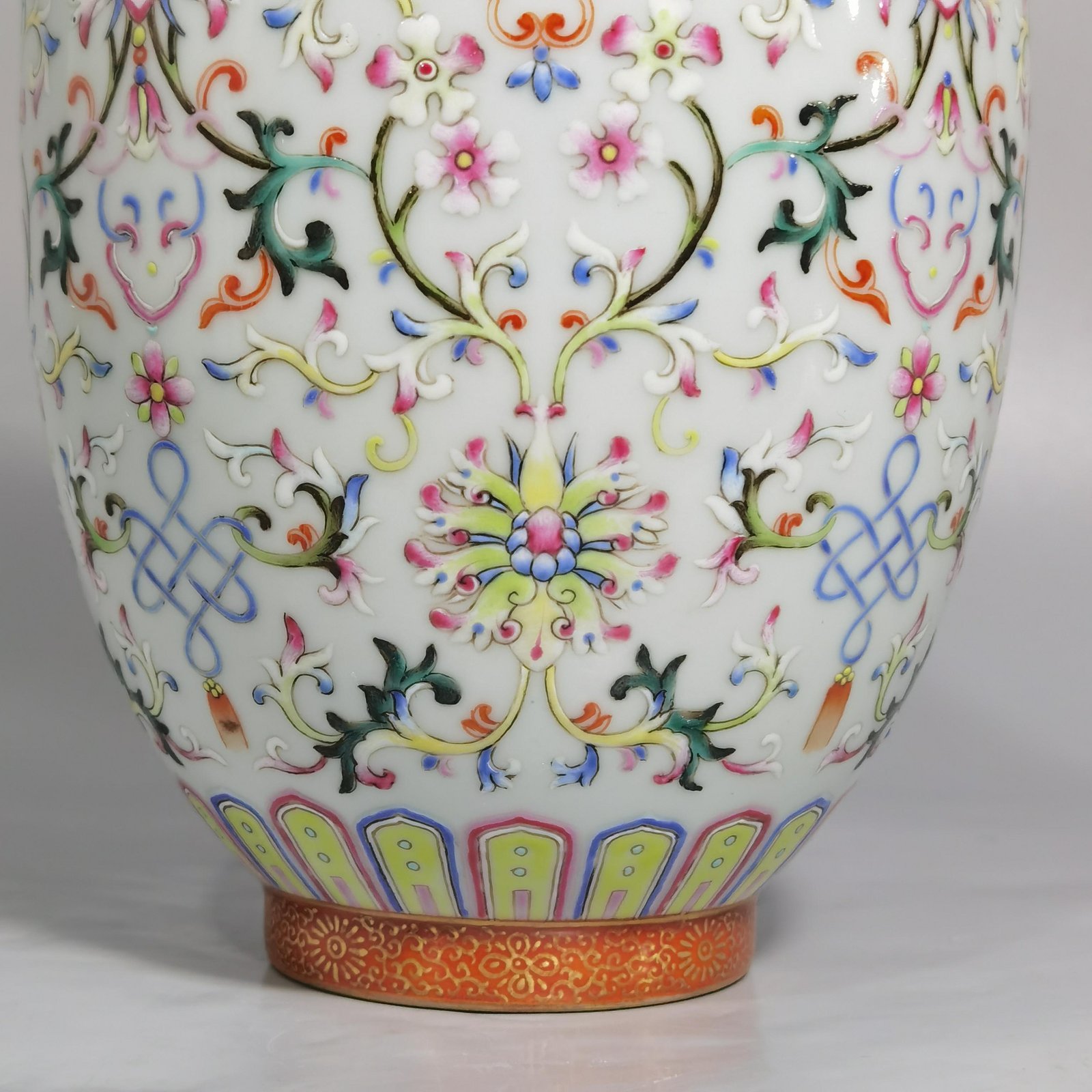 Qing Dynasty Qianlong white ground pastel colored lotus pattern covered jar