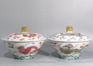 Qing Dynasty Qianlong pair of pastel clouds and dragons square button folding bowls