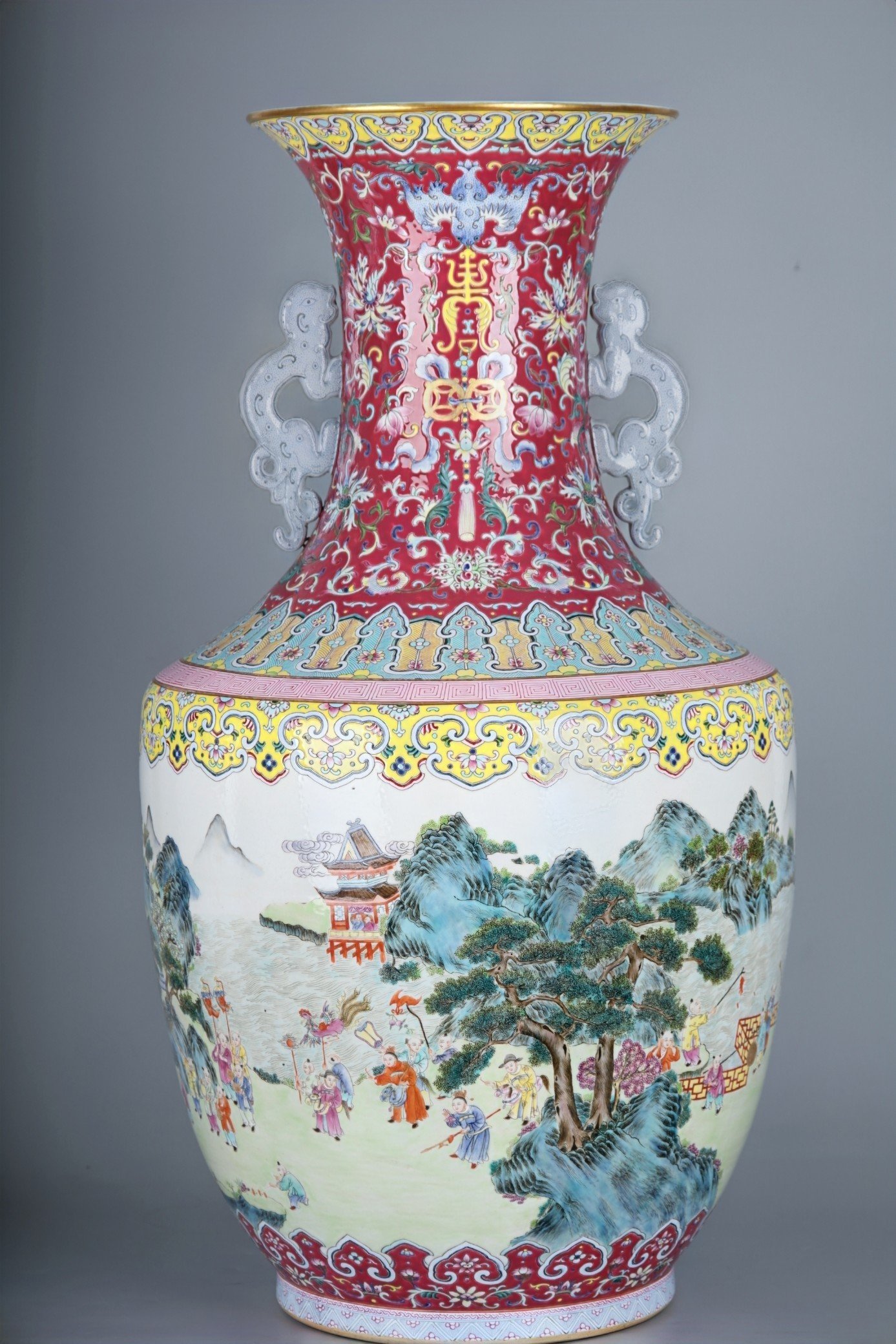 Qing Dynasty Qianlong famille rose flower s and dragon ears large vase