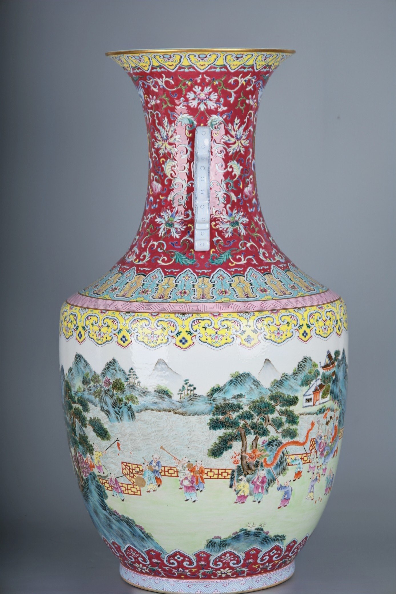 Qing Dynasty Qianlong famille rose flower s and dragon ears large vase