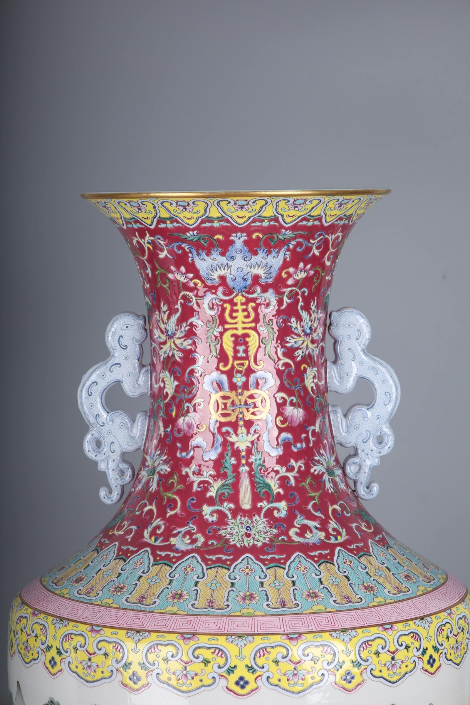 Qing Dynasty Qianlong famille rose flower s and dragon ears large vase