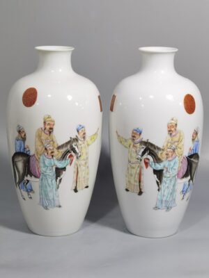 Qing Dynasty Qianlong pair of pastel-coloured plum vases