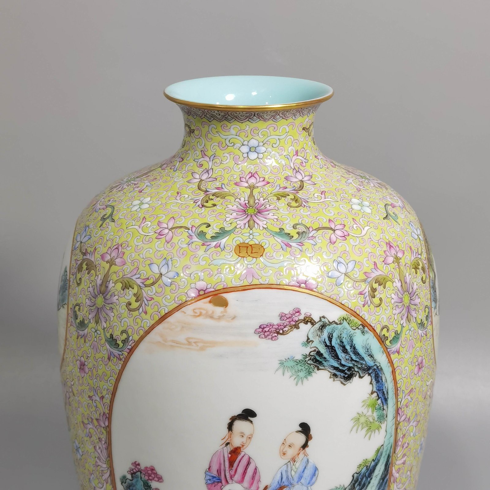 Qing Dynasty Qianlong pastel pine and green ground with intertwining lotus pattern plum vase