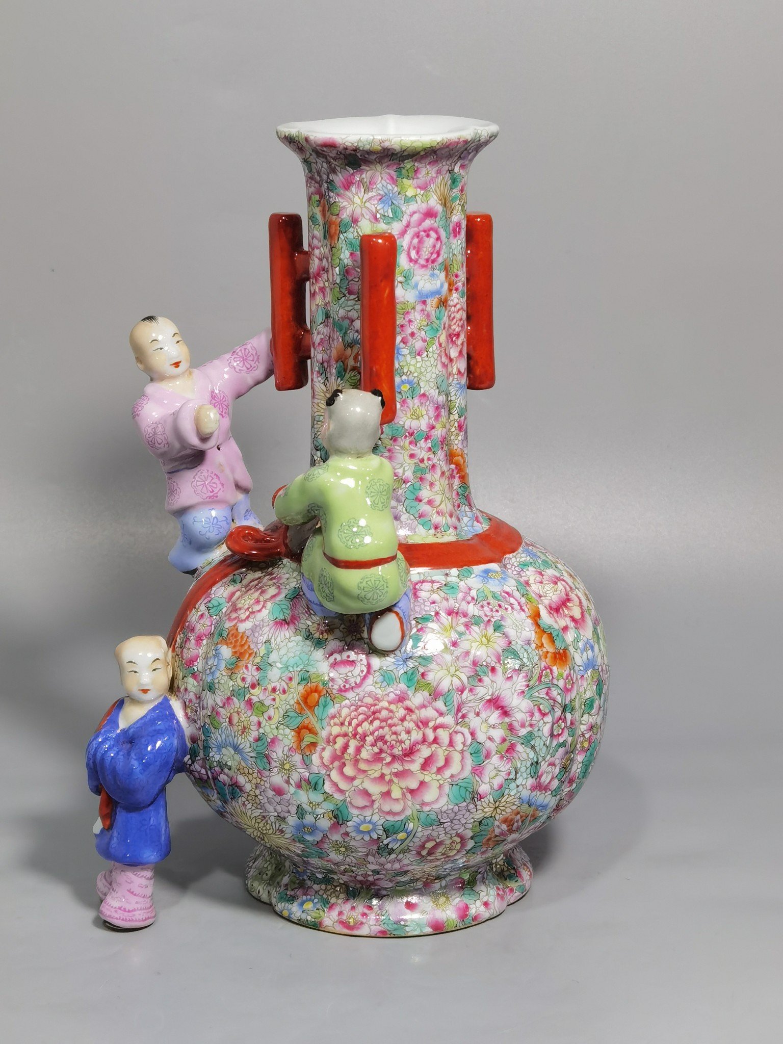 Qing Dynasty Qianlong famille rose color three-eared vase