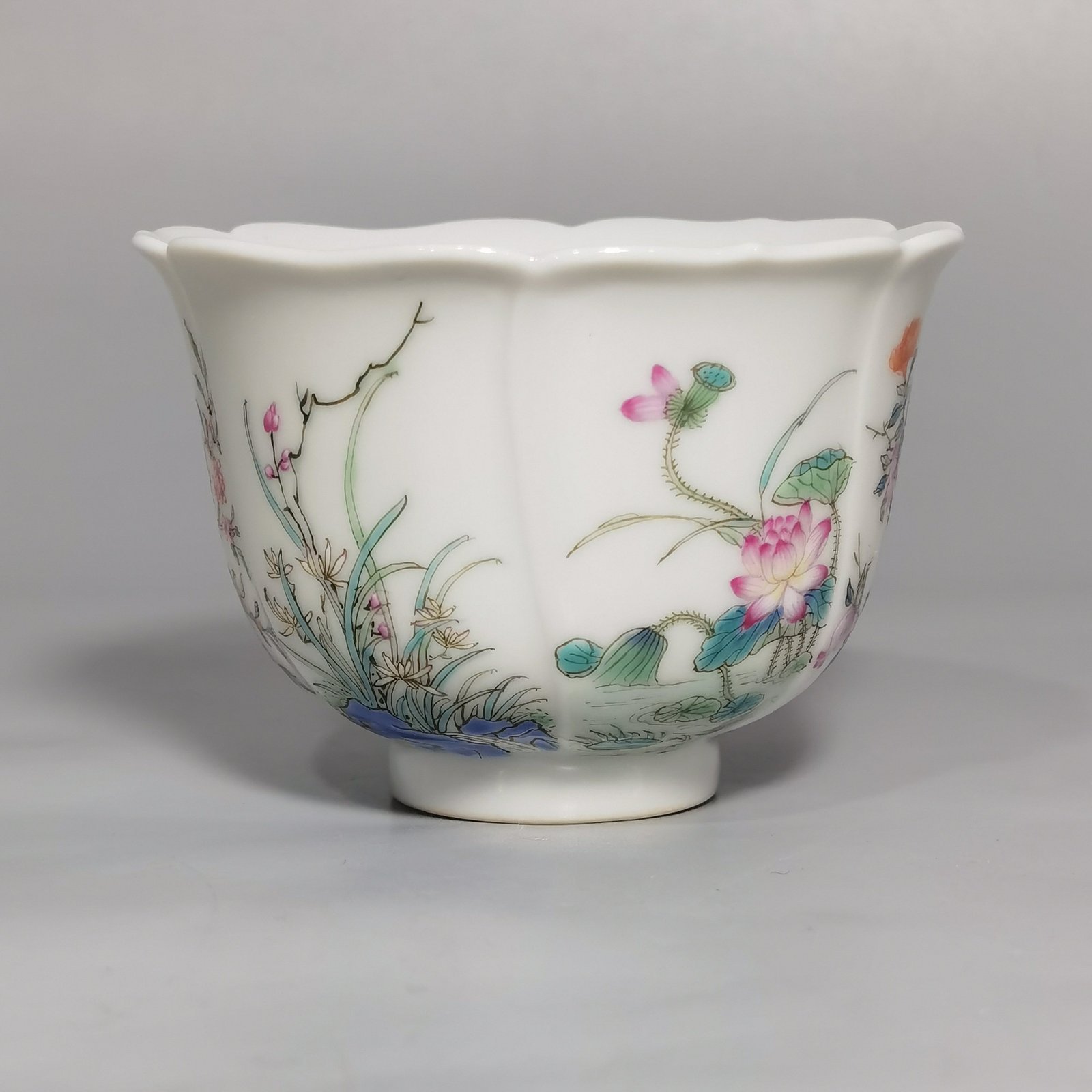 Qing Dynasty Qianlong pair of pastel flower Kuikou cups from the