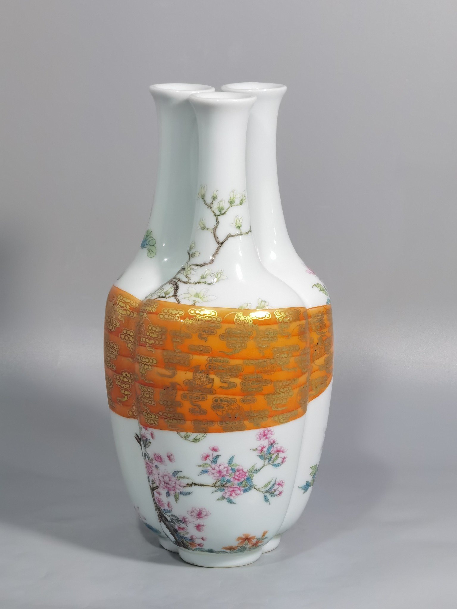 Qing Dynasty Qianlong Pastel flowers and gold-painted baggage three-tube vase