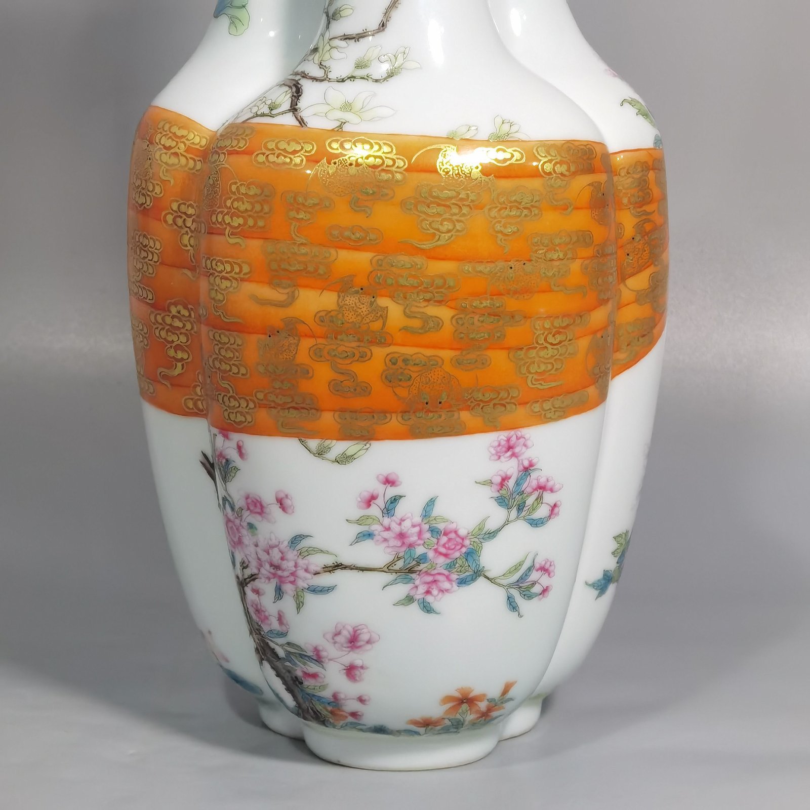 Qing Dynasty Qianlong Pastel flowers and gold-painted baggage three-tube vase