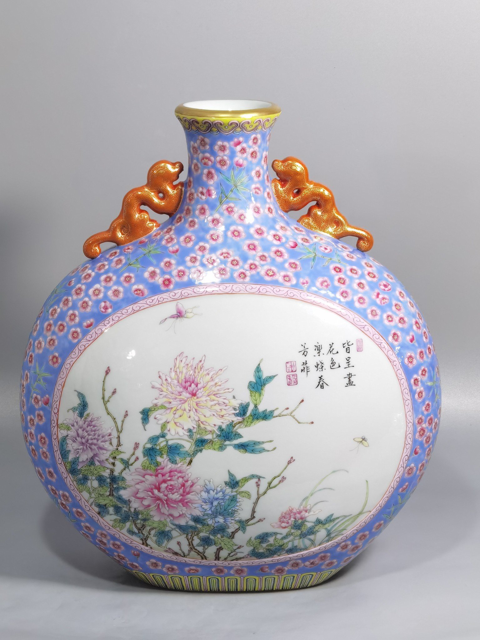 Qing Dynasty Qianlong pastel blue ground with plum and bamboo flower mphora