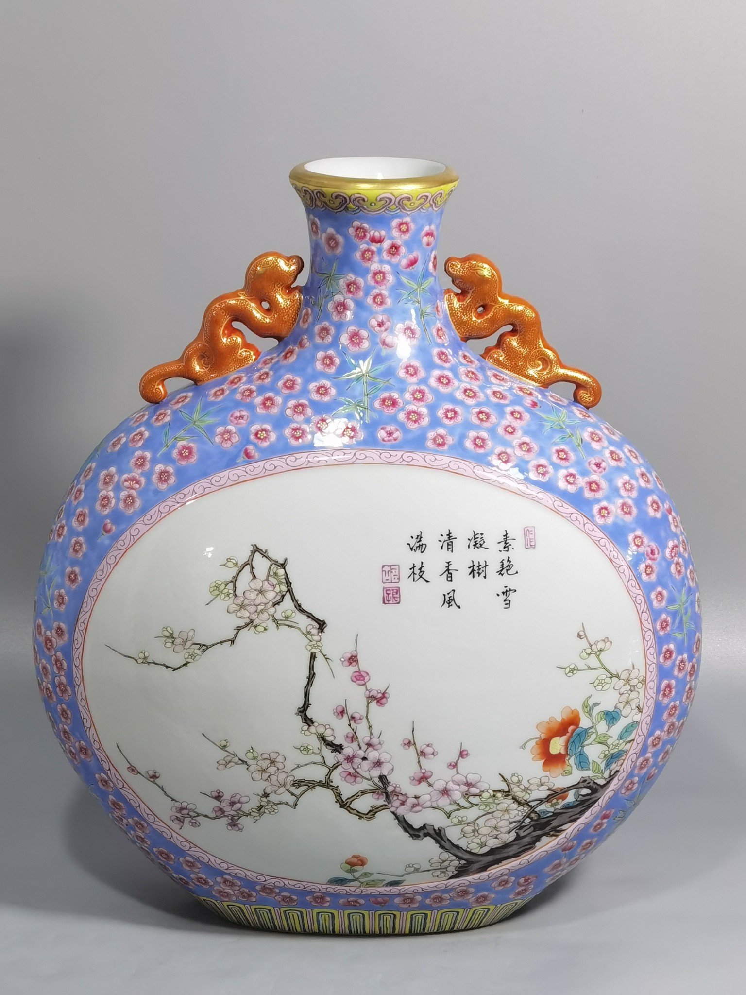 Qing Dynasty Qianlong pastel blue ground with plum and bamboo flower mphora