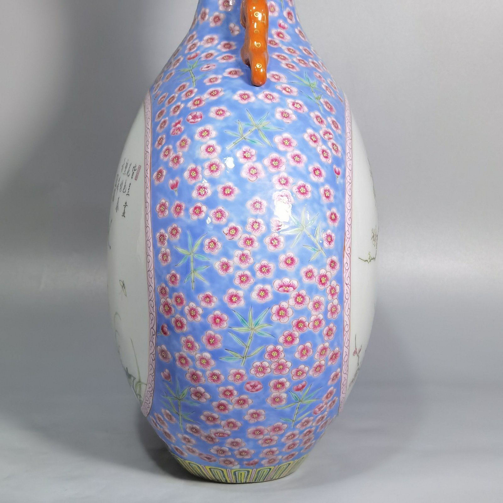 Qing Dynasty Qianlong pastel blue ground with plum and bamboo flower mphora