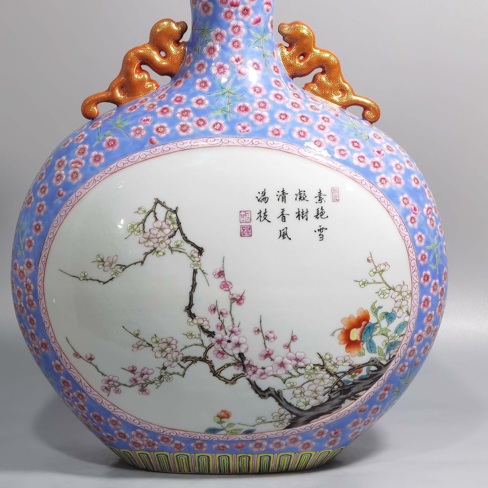Qing Dynasty Qianlong pastel blue ground with plum and bamboo flower mphora