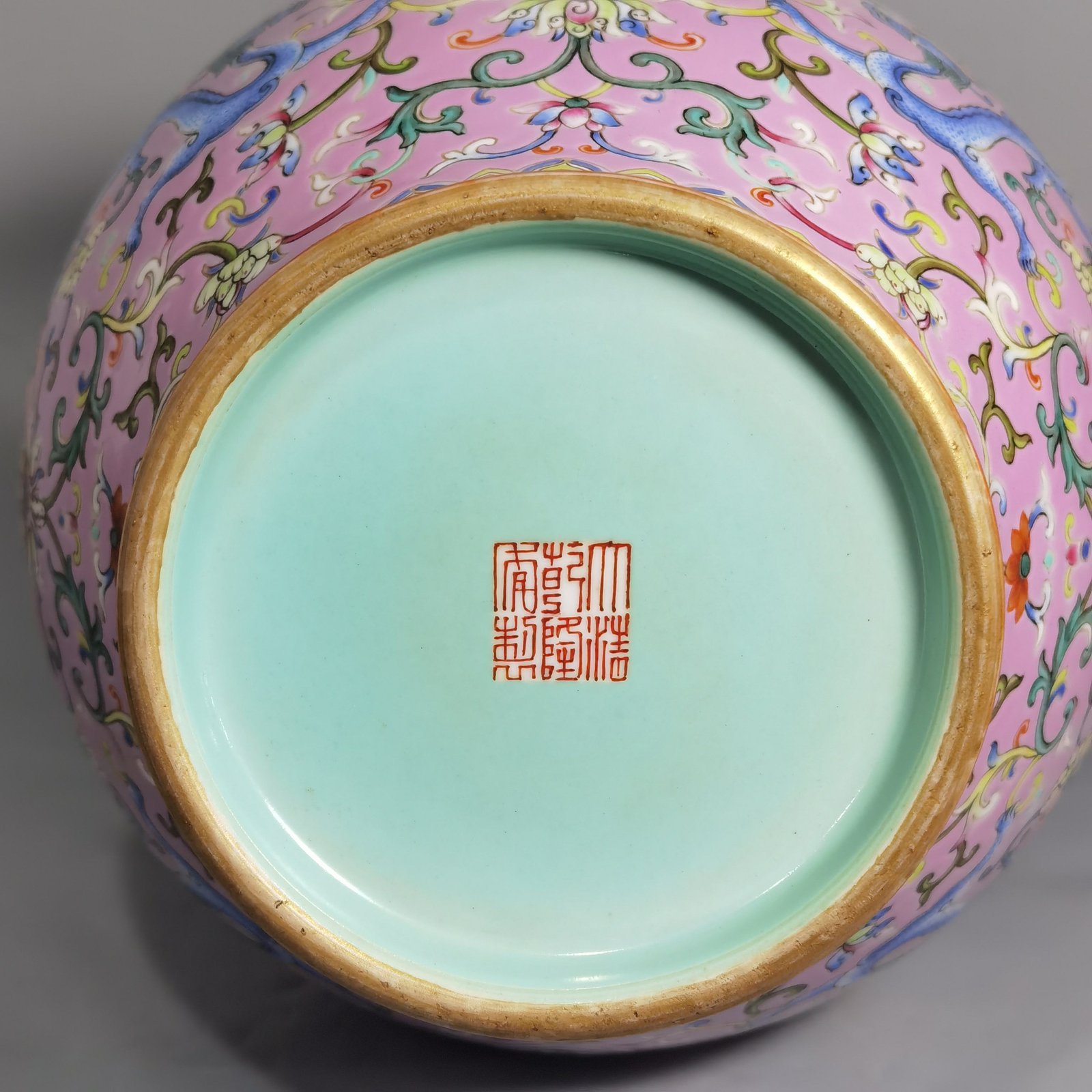 Qing Dynasty Qianlong pink ground pastel color Ruyi ear streamer flower mouth vase