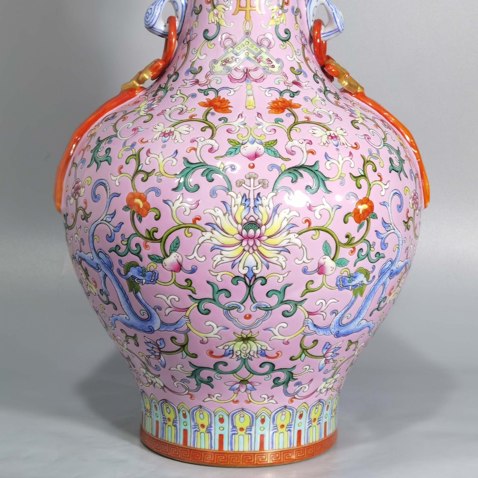 Qing Dynasty Qianlong pink ground pastel color uyi ear streamer flower mouth vase