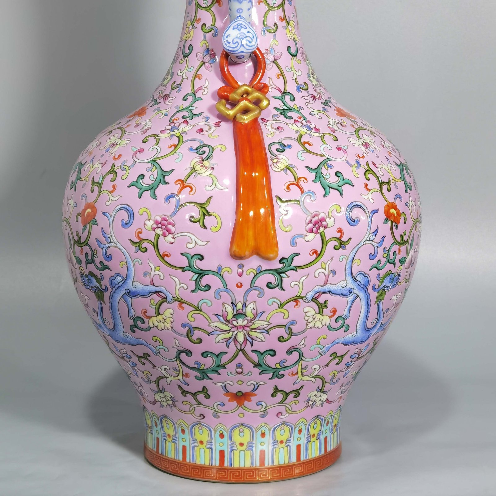 Qing Dynasty Qianlong pink ground pastel color uyi ear streamer flower mouth vase