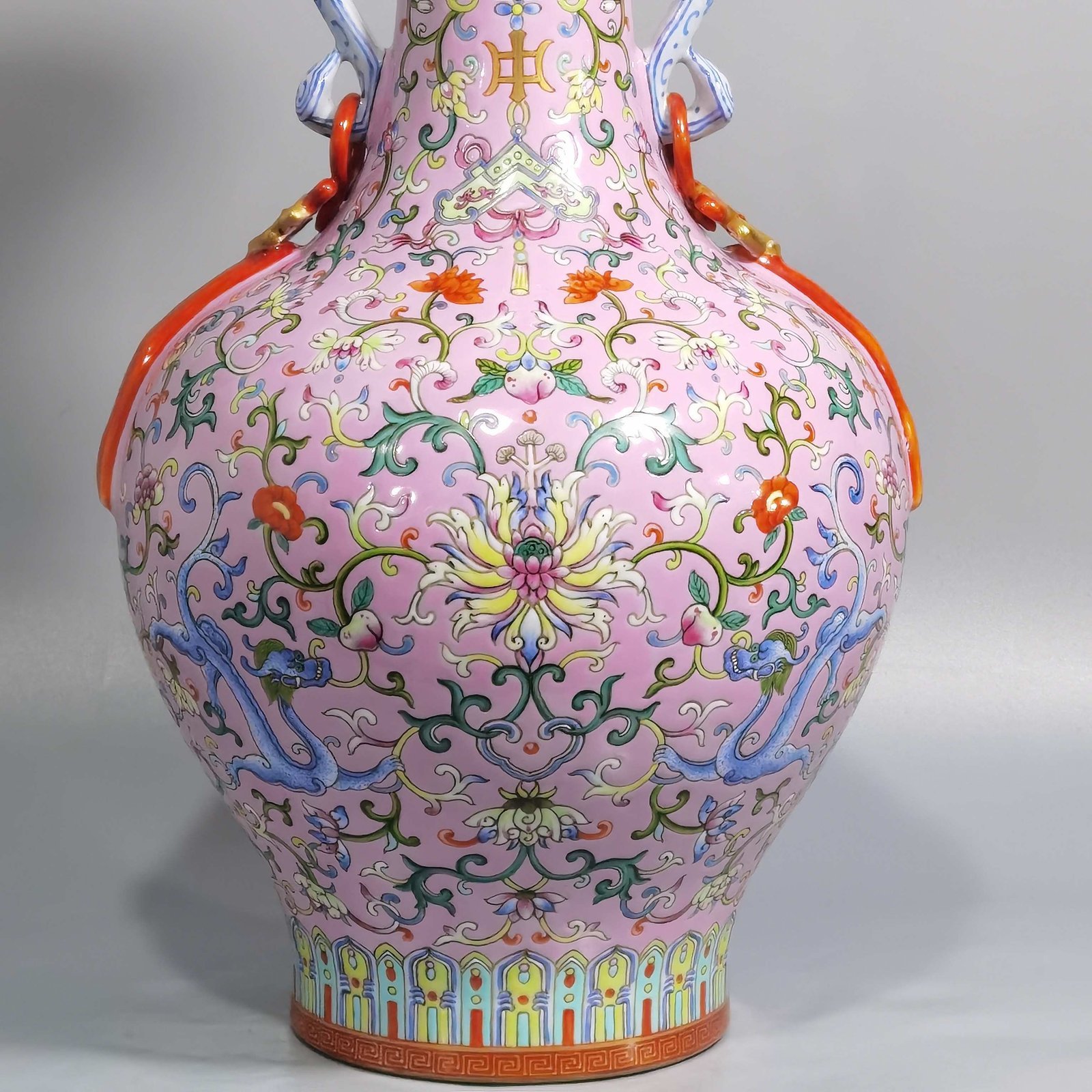 Qing Dynasty Qianlong pink ground pastel color uyi ear streamer flower mouth vase