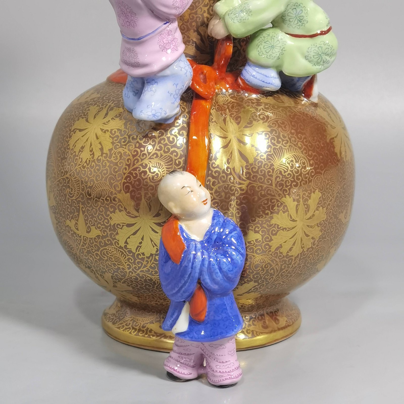 Qing Dynasty Qianlong purple gold glaze and gold pastel three-eared boy’s vase