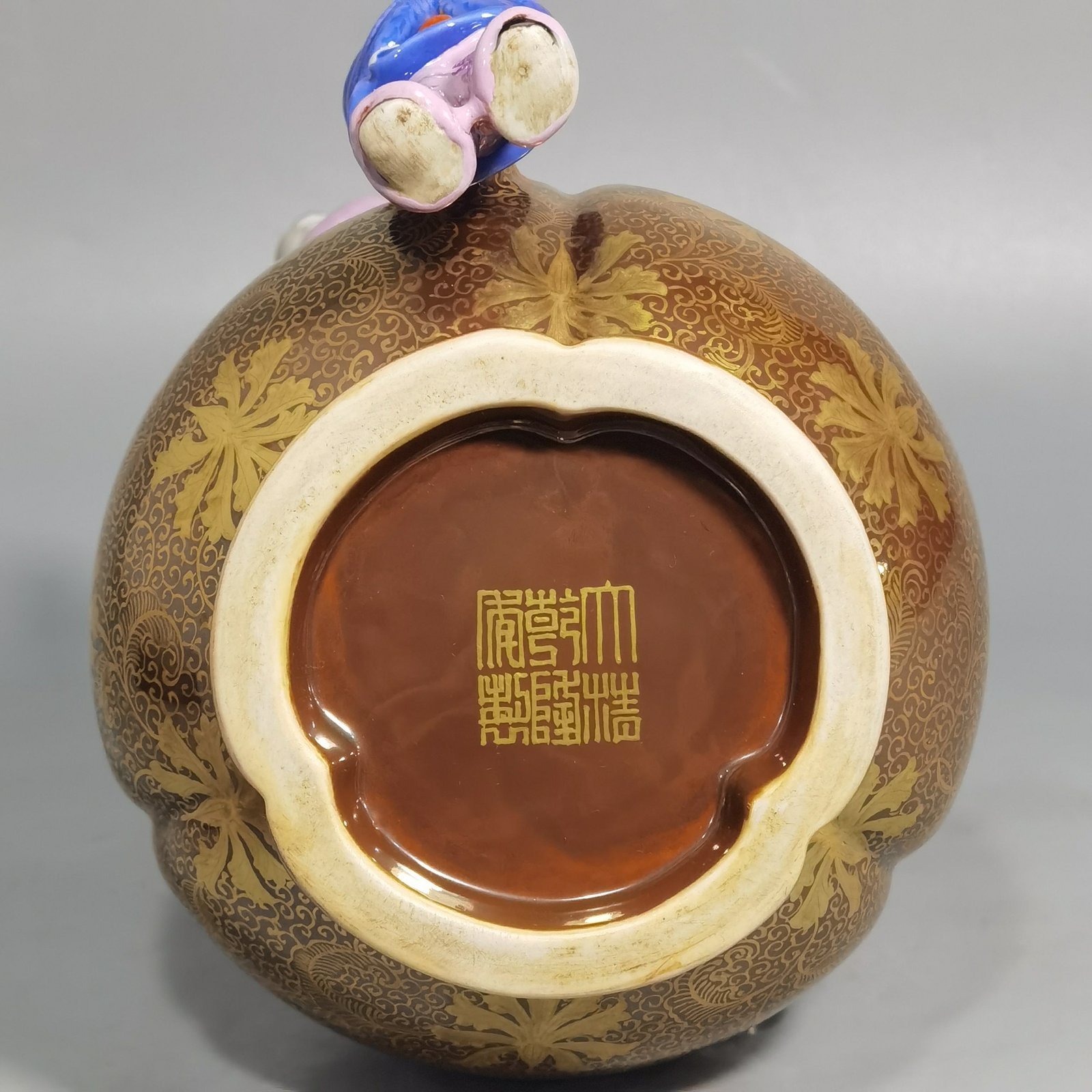 Qing Dynasty Qianlong purple gold glaze and gold pastel three-eared boy’s vase
