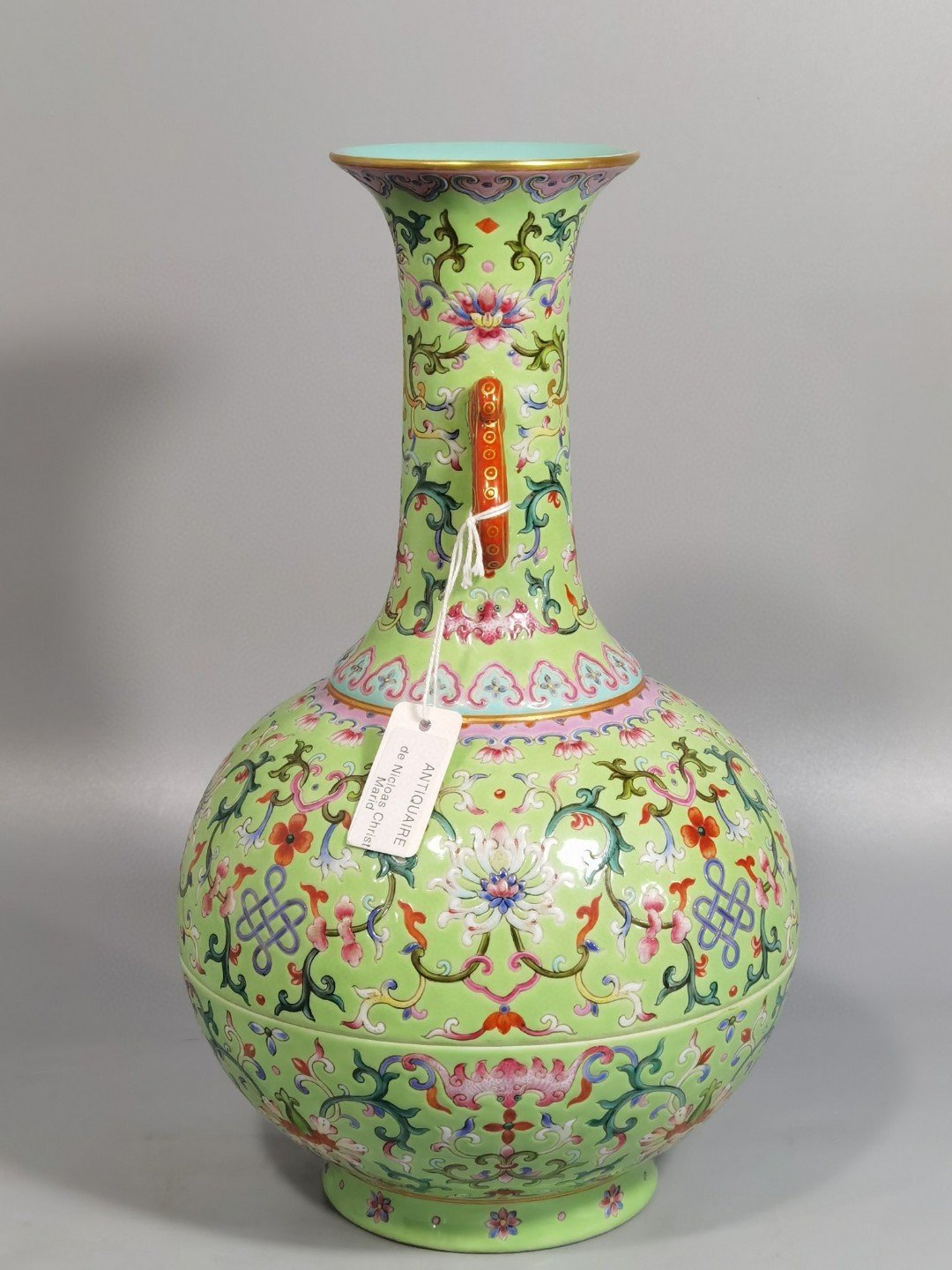 Qing Dynasty Qianlong green and pastel color double-ear capped bottle
