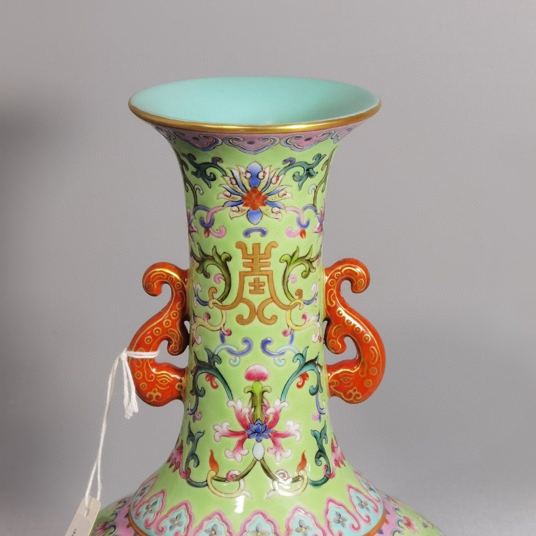 Qing Dynasty Qianlong green and pastel color double-ear capped bottle