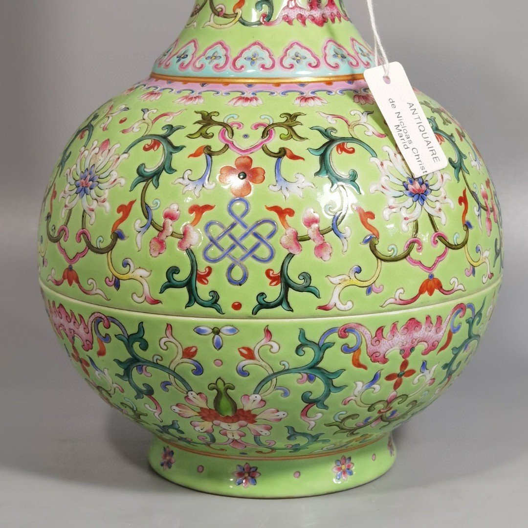 Qing Dynasty Qianlong green and pastel color double-ear capped bottle