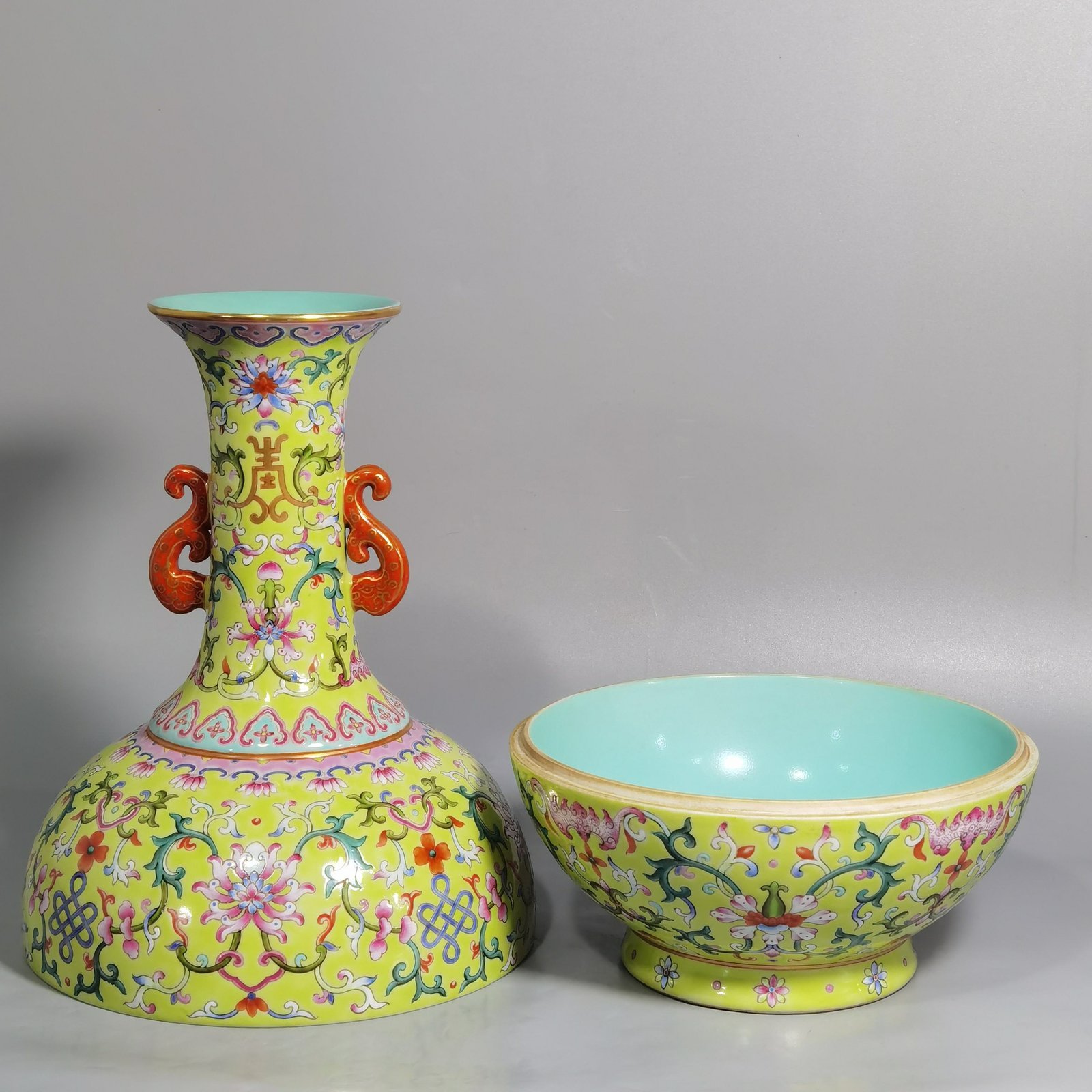 Qing Dynasty Qianlong green and pastel color double-ear capped bottle