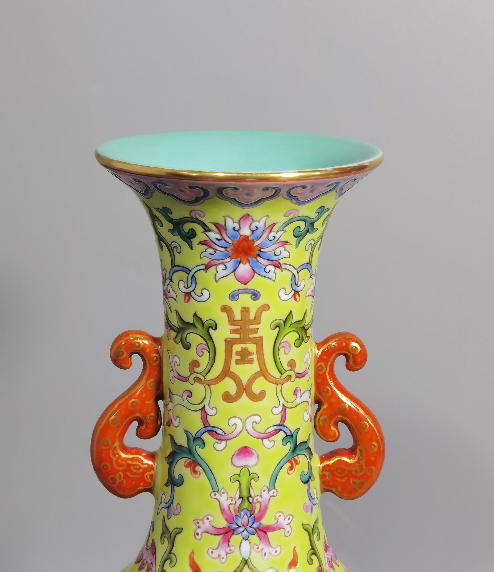 Qing Dynasty Qianlong green and pastel color double-ear capped bottle