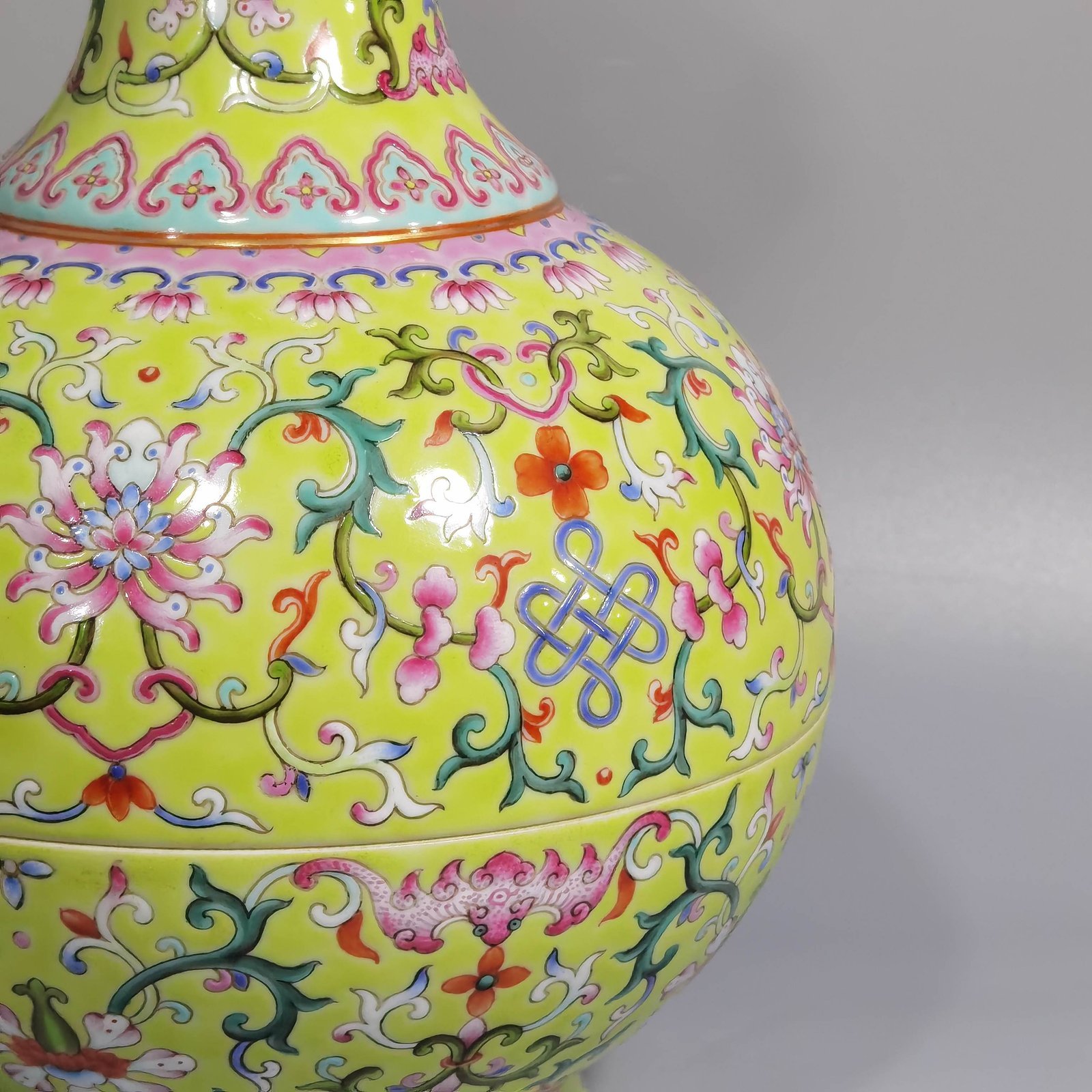 Qing Dynasty Qianlong green and pastel color double-ear capped bottle