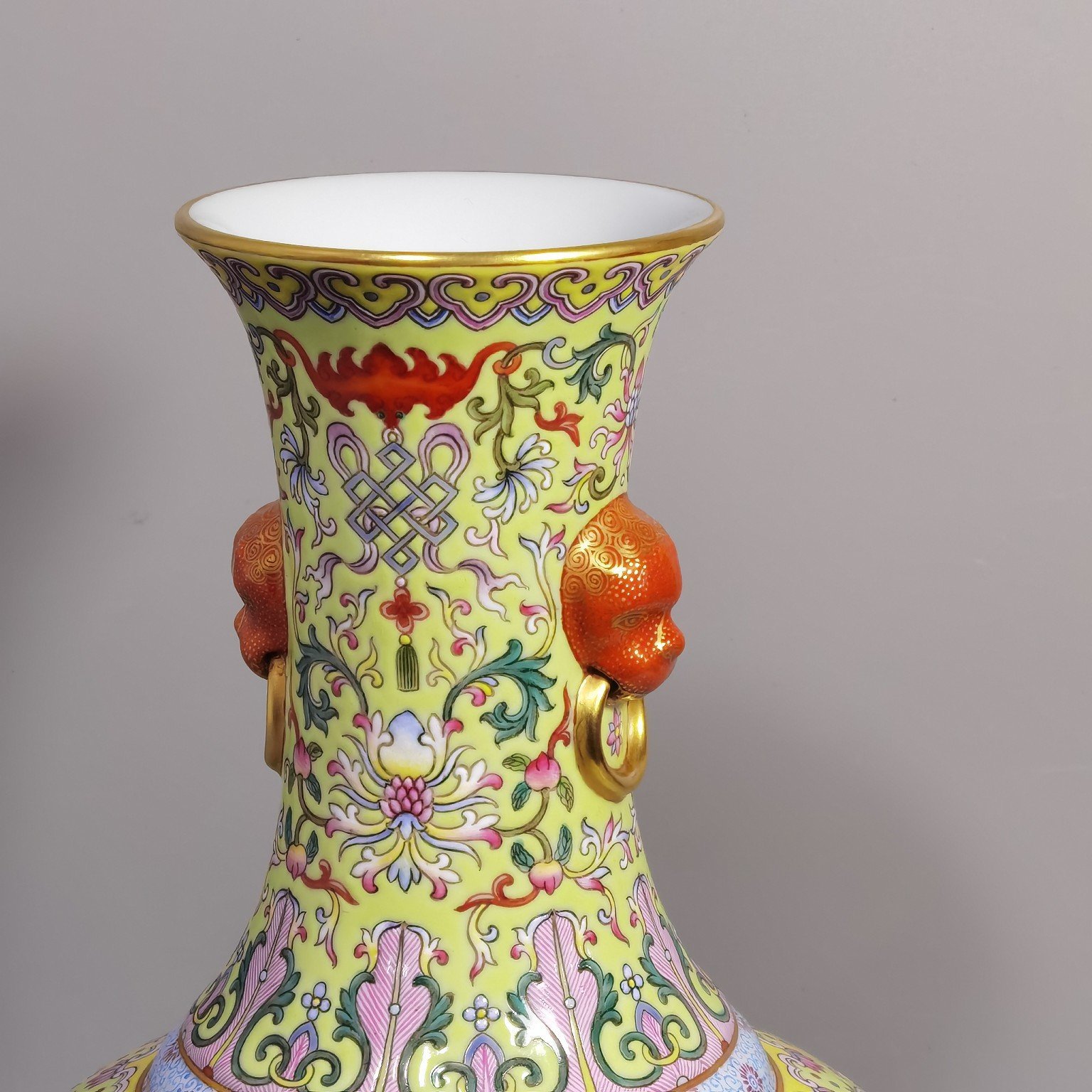 Qing Dynasty Qianlong green and pastel lotus and nimal ears skimming bottle