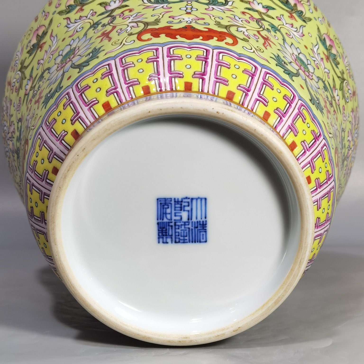 Qing Dynasty Qianlong green and pastel lotus and nimal ears skimming bottle