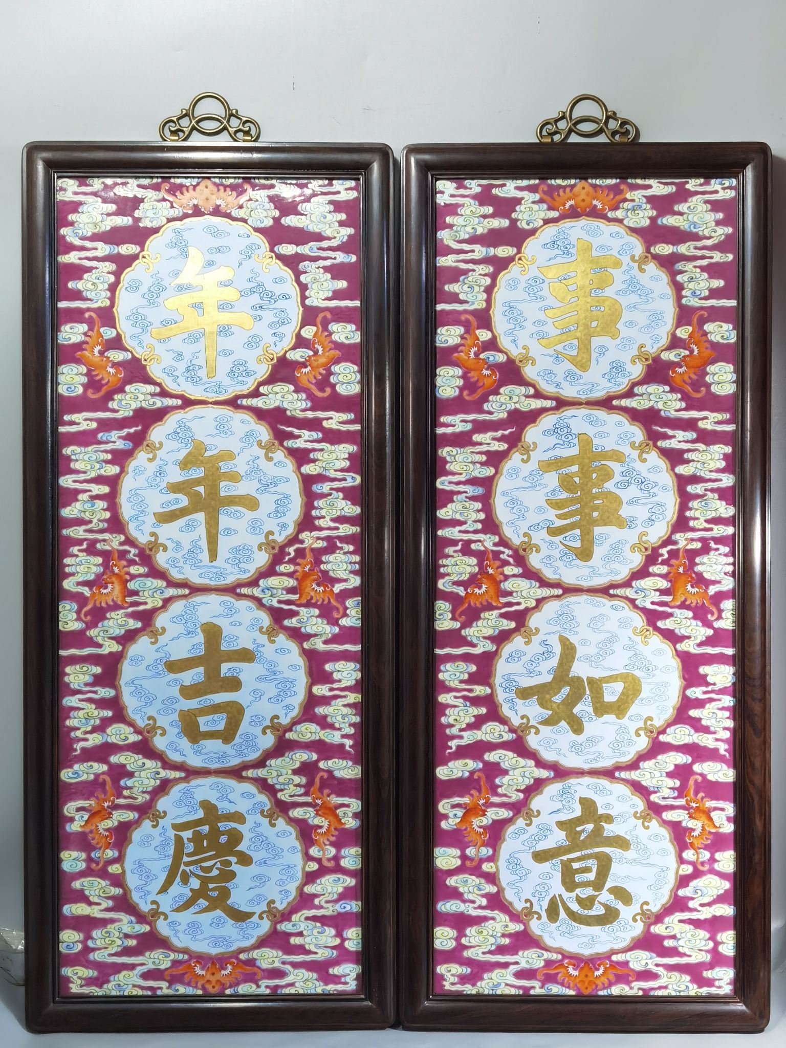Qing Dynasty Qianlong rouge ground pastel and gold pair of porcelain plates