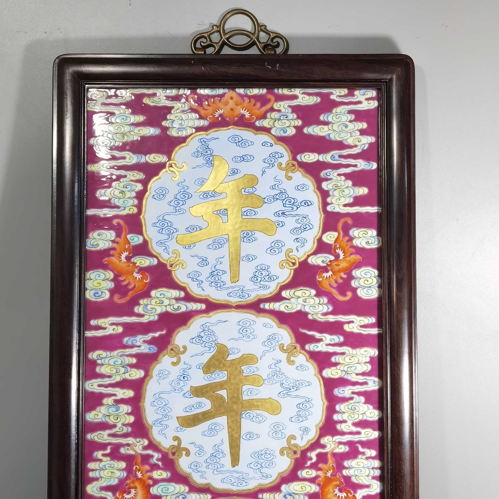 Qing Dynasty Qianlong rouge ground pastel and gold pair of porcelain plates