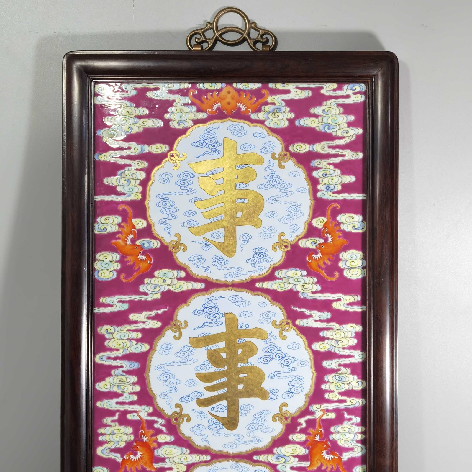 Qing Dynasty Qianlong rouge ground pastel and gold pair of porcelain plates