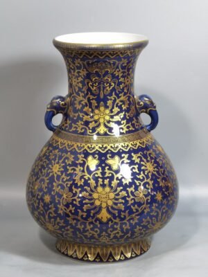 Qing Dynasty Qianlong purse blue glaze painted with gold and longevity lotus pattern elephant ear vase