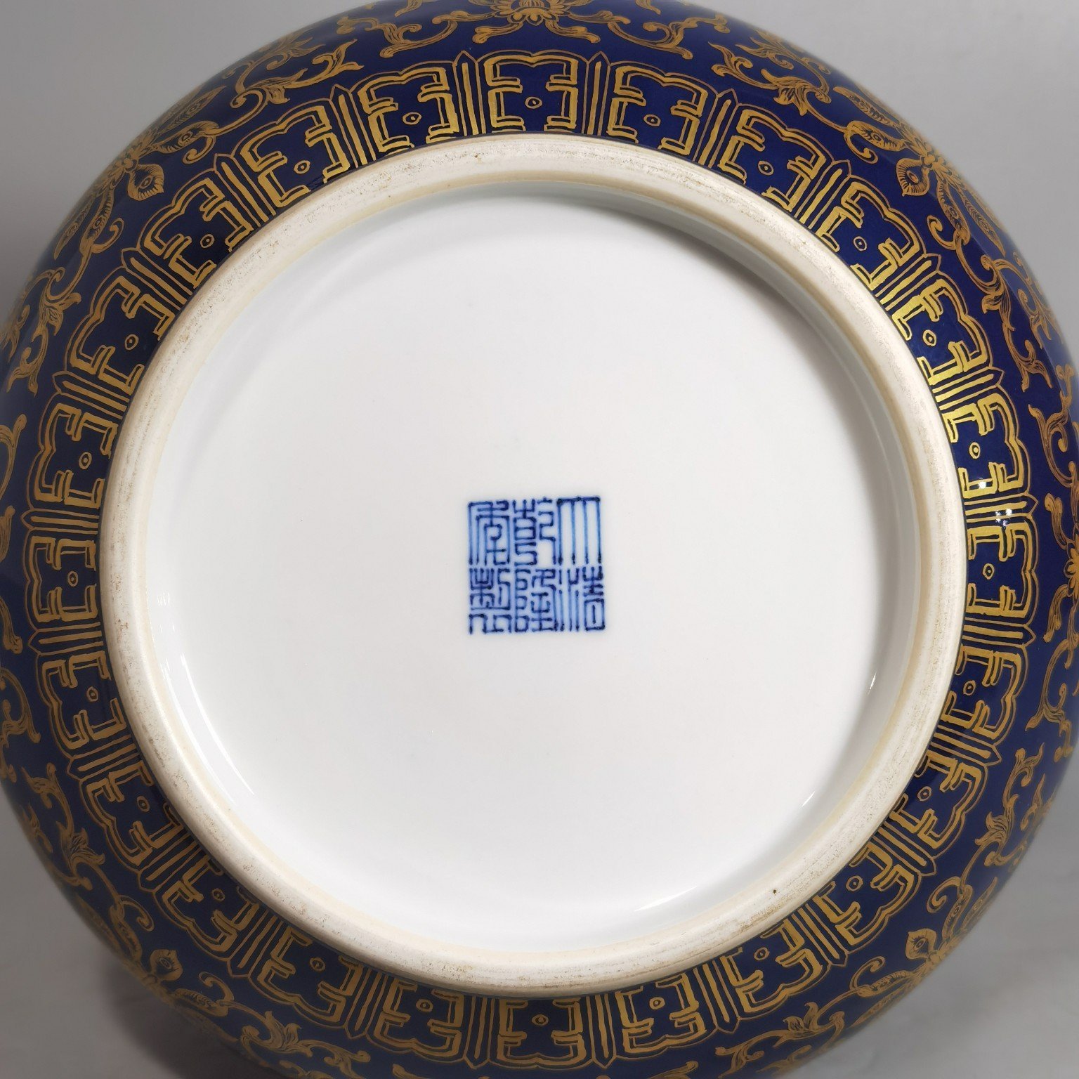 Qing Dynasty Qianlong purse blue glaze painted with gold and longevity lotus pattern elephant ear vase